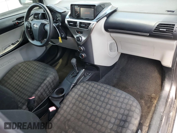 2012 Scion iQ with VIN JTNJJXB06CJ011117, listed as a Copart auction lot 52694345 with 94,547 mi miles and Salvage Title. Bid and sale history available at carsss.com. Image 8.