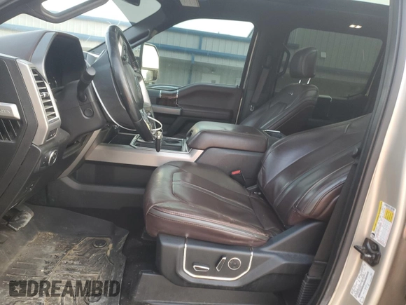2017 Ford F-250 Lariat with VIN 1FT7W2BT0HEE63562, listed as a Copart auction lot 60880545 with 122,996 mi miles and Salvage title. Bid and sale history available at DreamBid. Image 7.
