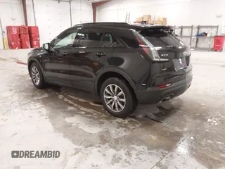 2020 Cadillac XT4 AWD Sport with VIN 1GYFZFR43LF090264, listed as a IAAI auction lot 41261586 with 65,859 mi miles and . Bid and sale history available at DreamBid. Image 3.