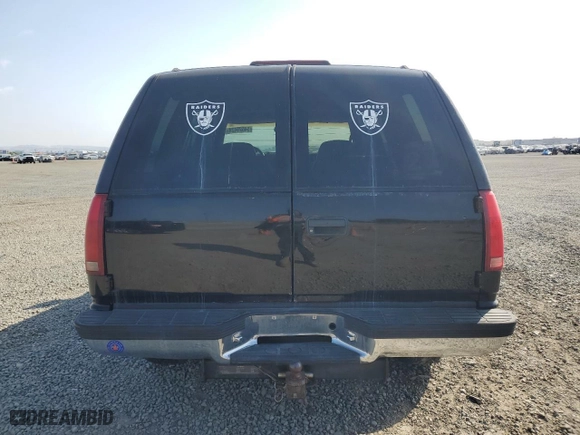 1999 Chevrolet Tahoe Z71 with VIN 1GNEK13R5XJ308924, listed as a Copart auction lot 64463984 with 229,181 mi miles and Salvage Title. Bid and sale history available at carsss.com. Image 6.