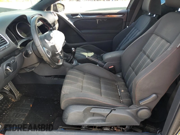 2012 Volkswagen GTI w/Conv & Sunroof с VIN WVWEV7AJ5CW145480, выставлен на аукционе Copart как лот 71466434 с пробегом Не указан миль и Списание • Salvage title. История ставок и продаж доступна на DreamBid. Изображение 7.