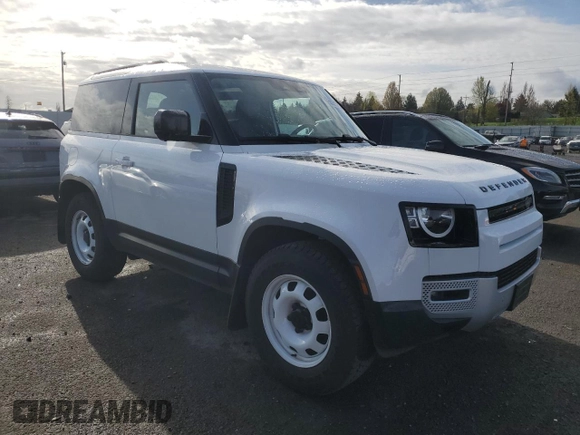 2023 Land Rover Defender S with VIN SALEJ6EX7P2227141, listed as a Copart auction lot 50351785 with 8,810 mi miles and Salvage title. Bid and sale history available at DreamBid. Image 4.