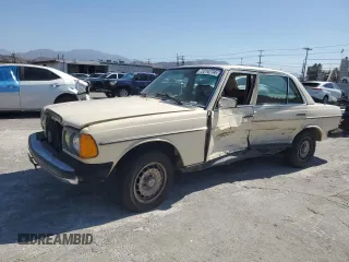 1982 Mercedes-Benz 300 with VIN WDBAB33A5CB001849, listed as a Copart auction lot 72214714 with 202,259 mi miles and Salvage Title. Bid and sale history available at carsss.com. Image 1.