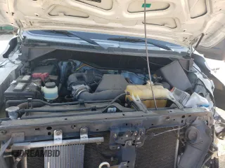 2015 Nissan NV Cargo SV z VIN 1N6BF0KY1FN803399, wystawiony jako Copart lot #66112564 z przebiegiem Nie podano mil oraz Szkoda całkowita • Salvage title. Historia ofert i sprzedaży dostępna na DreamBid. Obrazek 12.