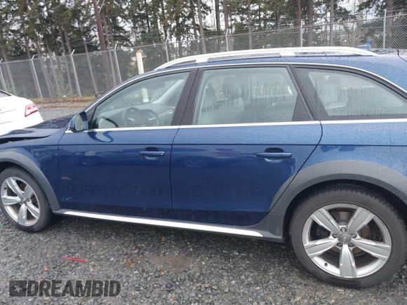 2014 Audi allroad A4 Premium Plus z VIN WA1UFAFL4EA121651, wystawiony jako IAAI lot #41579256 z przebiegiem 76 916 mil mil oraz . Historia ofert i sprzedaży dostępna na DreamBid. Obrazek 14.