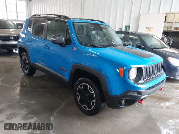 2015 Jeep Renegade Trailhawk with VIN ZACCJBCT0FPB59264, listed as a IAAI auction lot 42203406 with 109,000 mi miles and . Bid and sale history available at DreamBid. Image 1.