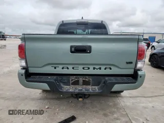 2023 Toyota Tacoma SR with VIN 3TMCZ5AN2PM580515, listed as a Copart auction lot 60422635 with 65,846 mi miles and Salvage title. Bid and sale history available at DreamBid. Image 6.
