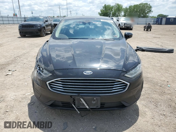 2020 Ford Fusion SE z VIN 3FA6P0LUXLR254247, wystawiony jako Copart lot #60658095 z przebiegiem 76 413 mil mil oraz Szkoda całkowita • Salvage title. Historia ofert i sprzedaży dostępna na DreamBid. Obrazek 5.