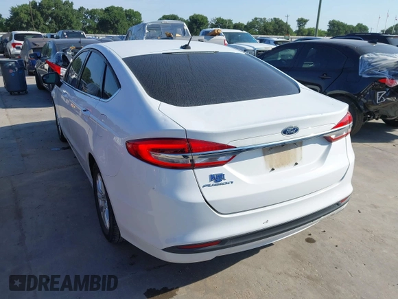 2018 Ford Fusion S z VIN 3FA6P0G76JR109403, wystawiony jako IAAI lot #42231625 z przebiegiem 109 018 mil mil oraz . Historia ofert i sprzedaży dostępna na DreamBid. Obrazek 3.