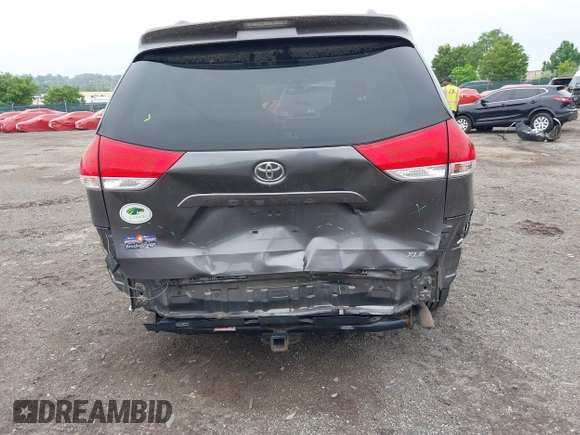 2014 Toyota Sienna XLE with VIN 5TDYK3DC0ES436502, listed as a IAAI auction lot 42180990 with 154,839 mi miles and . Bid and sale history available at DreamBid. Image 6.