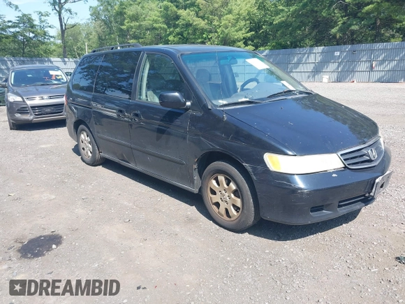 2003 Honda Odyssey EX-L with VIN 5FNRL18003B042487, listed as a IAAI auction lot 42604399 with 188,126 mi miles and . Bid and sale history available at DreamBid. Image 1.
