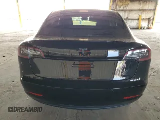 2018 Tesla Model 3 Long Range Battery with VIN 5YJ3E1EA6JF011383, listed as a Copart auction lot 51147185 with 148,507 mi miles and Clean Title. Bid and sale history available at DreamBid. Image 6.