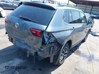 2021 Volkswagen Tiguan SE z VIN 3VV3B7AX7MM113248, wystawiony jako IAAI lot #42025906 z przebiegiem 92 442 mil mil oraz . Historia ofert i sprzedaży dostępna na DreamBid. Obrazek 4.