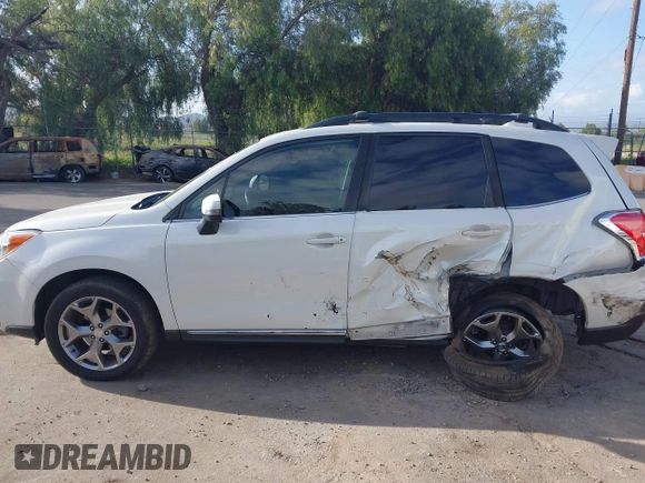 2016 Subaru Forester Touring with VIN JF2SJAXC7GH565287, listed as a IAAI auction lot 41947083 with 126,563 mi miles and . Bid and sale history available at DreamBid. Image 14.