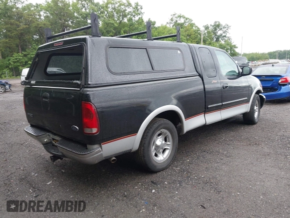 2000 Ford F-150 XL z VIN 1FTRX17L2YNB60131, wystawiony jako IAAI lot #42295537 z przebiegiem 216 638 mil mil oraz . Historia ofert i sprzedaży dostępna na DreamBid. Obrazek 4.