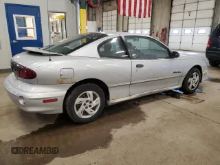 2001 Pontiac Sunfire SE z VIN 1G2JB124717145098, wystawiony jako Copart lot #48211645 z przebiegiem 97 886 mil mil oraz Czysty tytuł • Clean title. Historia ofert i sprzedaży dostępna na DreamBid. Obrazek 3.