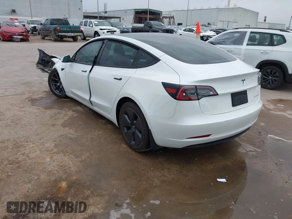 2021 Tesla Model 3 Long Range with VIN 5YJ3E1EB3MF059713, listed as a IAAI auction lot 41778289 with 52,211 mi miles. Bid and sale history available at carsss.com. Image 3.