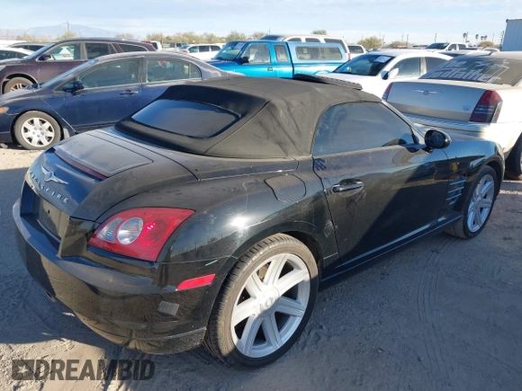 2005 Chrysler Crossfire with VIN 1C3AN55L55X051986, listed as a IAAI auction lot 41288735 with 97,853 mi miles and . Bid and sale history available at DreamBid. Image 4.