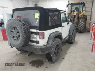 2016 Jeep Wrangler Sport with VIN 1C4AJWAG9GL261958, listed as a IAAI auction lot 41595490 with 32,433 mi miles and . Bid and sale history available at carsss.com. Image 4.