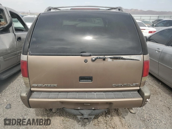1997 Chevrolet Blazer LS with VIN 1GNCS13W3V2197732, listed as a Copart auction lot 56792025 with 203,968 mi miles and Non repairable. Bid and sale history available at DreamBid. Image 6.