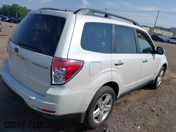 2009 Subaru Forester X with VIN JF2SH63639H791581, listed as a IAAI auction lot 42754561 with 99,938 mi miles and . Bid and sale history available at DreamBid. Image 4.