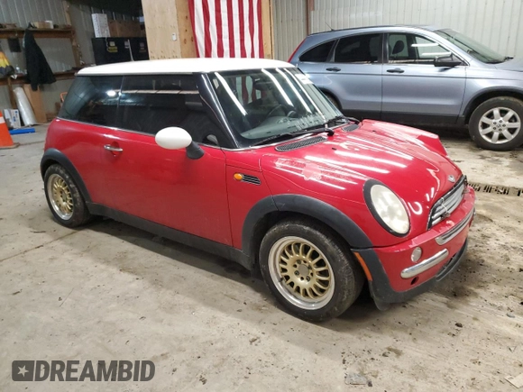 2002 MINI Hardtop with VIN WMWRC33452TC35333, listed as a Copart auction lot 44447425 with 166,353 mi miles and Salvage Title. Bid and sale history available at DreamBid. Image 4.