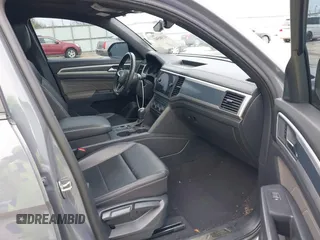 2021 Volkswagen Atlas SE with VIN 1V2PE2CAXMC231037, listed as a IAAI auction lot 41380581 with 40,889 mi miles and . Bid and sale history available at DreamBid. Image 5.