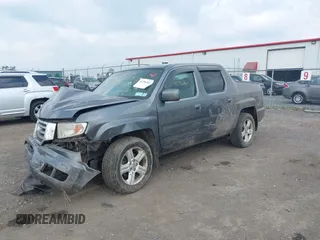 2013 Honda Ridgeline RTL with VIN 5FPYK1F56DB004834, listed as a IAAI auction lot 42706361 with 230,000 mi miles and . Bid and sale history available at DreamBid. Image 17.
