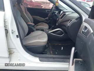 2012 Hyundai Veloster w/Gray Int с VIN KMHTC6ADXCU074298, выставлен на аукционе IAAI как лот 42353923 с пробегом 129 114 миль миль и . История ставок и продаж доступна на DreamBid. Изображение 5.