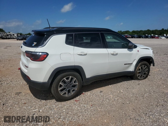 2021 Jeep Compass Trailhawk with VIN 3C4NJDDB2MT583833, listed as a Copart auction lot 58736675 with 67,090 mi miles and Salvage title. Bid and sale history available at DreamBid. Image 3.