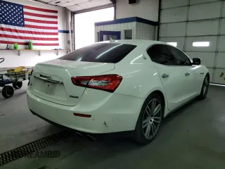 2015 Maserati Ghibli S Q4 with VIN ZAM57RTA8F1153413, listed as a Copart auction lot 42152062 with 54,884 mi miles. Bid and sale history available at carsss.com. Image 4.