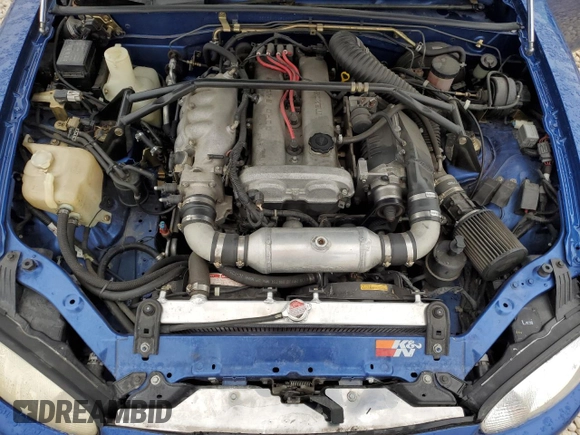 1999 Mazda MX-5 Miata with VIN JM1NB3532X0134801, listed as a Copart auction lot 83838374 with 97,015 mi miles and Salvage title. Bid and sale history available at DreamBid. Image 12.