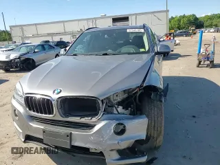 2015 BMW X5 xDrive35d z VIN 5UXKS4C50F0N08784, wystawiony jako Copart lot #57348185 z przebiegiem 168 452 mil mil oraz Szkoda całkowita • Salvage title. Historia ofert i sprzedaży dostępna na DreamBid. Obrazek 14.