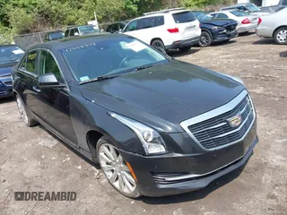 2015 Cadillac ATS Luxury RWD z VIN 1G6AB5SA5F0115531, wystawiony jako IAAI lot #42458379 z przebiegiem 43 213 mil mil oraz . Historia ofert i sprzedaży dostępna na DreamBid. Obrazek 1.