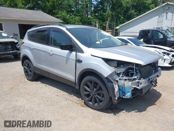 2017 Ford Escape SE z VIN 1FMCU9G95HUD37371, wystawiony jako IAAI lot #42393304 z przebiegiem 76 039 mil mil oraz . Historia ofert i sprzedaży dostępna na DreamBid. Obrazek 1.
