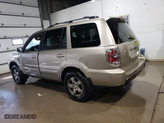 2006 Honda Pilot EX-L with VIN 5FNYF18516B004298, listed as a Copart auction lot 52034645 with 276,019 mi miles and Salvage Title. Bid and sale history available at carsss.com. Image 2.