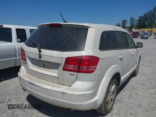 2009 Dodge Journey SXT with VIN 3D4GG57VX9T200489, listed as a IAAI auction lot 42048965 with 156,830 mi miles. Bid and sale history available at carsss.com. Image 4.