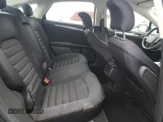 2015 Ford Fusion SE z VIN 3FA6P0H77FR198260, wystawiony jako Copart lot #59969135 z przebiegiem 91 356 mil mil oraz Szkoda całkowita • Salvage title. Historia ofert i sprzedaży dostępna na DreamBid. Obrazek 10.