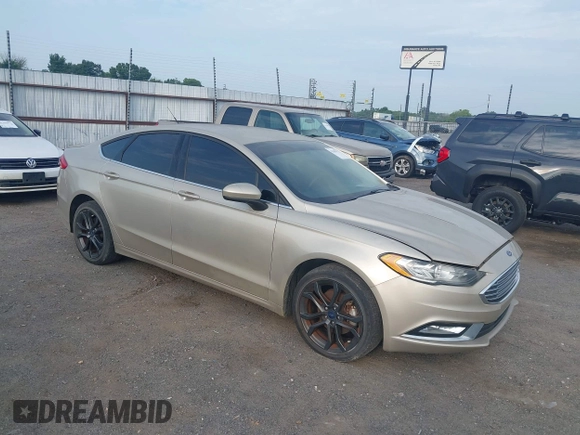 2018 Ford Fusion SE z VIN 3FA6P0HD6JR279927, wystawiony jako IAAI lot #42430172 z przebiegiem 145 080 mil mil oraz . Historia ofert i sprzedaży dostępna na DreamBid. Obrazek 1.