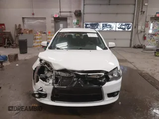 2014 Mitsubishi Lancer GT with VIN JA32U8FWXEU016230, listed as a IAAI auction lot 41379899 with 108,511 mi miles. Bid and sale history available at carsss.com. Image 12.