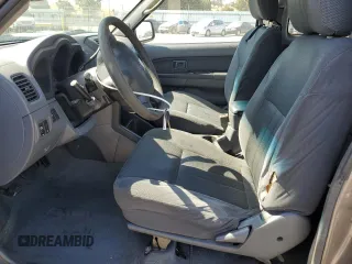 2004 Nissan Frontier XE with VIN 1N6DD26T14C412707, listed as a Copart auction lot 56789905 with 288,721 mi miles and Salvage title. Bid and sale history available at DreamBid. Image 7.