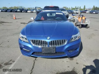 2016 BMW Z4 sDrive35is with VIN WBALM1C55GE634882, listed as a Copart auction lot 53873295 with 48,408 mi miles and Salvage Title. Bid and sale history available at carsss.com. Image 5.