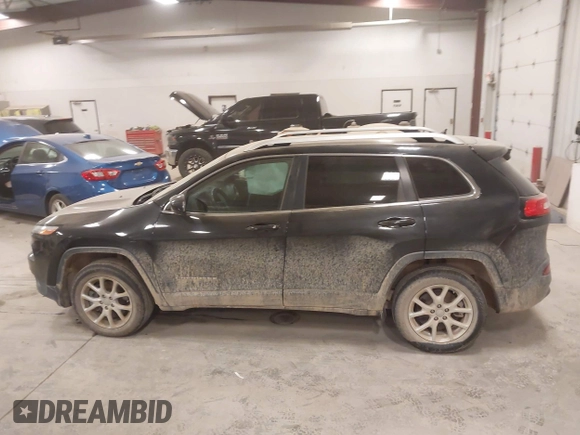 2015 Jeep Cherokee Latitude with VIN 1C4PJLCS8FW689849, listed as a IAAI auction lot 42144161 with 138,740 mi miles and . Bid and sale history available at carsss.com. Image 14.