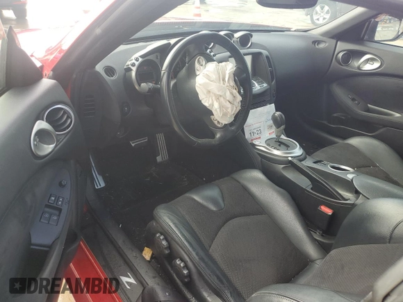 2014 Nissan 370Z Nismo with VIN JN1AZ4EH8EM633462, listed as a Copart auction lot 43250905 with Not Provided miles and Salvage Title. Bid and sale history available at DreamBid. Image 8.