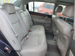 2005 Kia Amanti z VIN KNALD124055055725, wystawiony jako Copart lot #73573754 z przebiegiem 105 665 mil mil oraz Tytuł czysty. Historia ofert i sprzedaży dostępna na DreamBid. Obrazek 10.