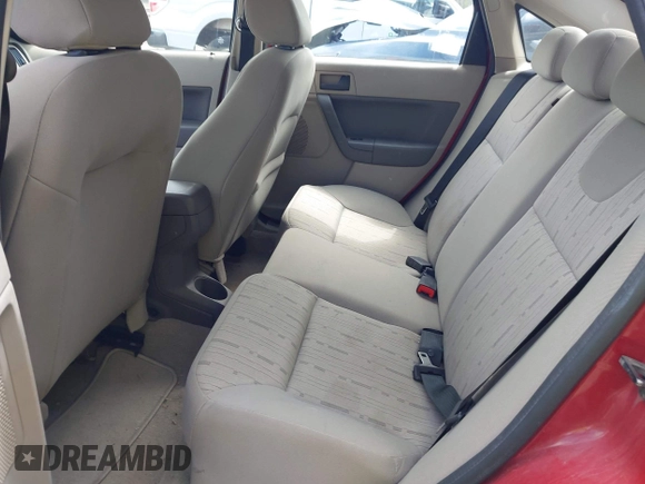 2009 Ford Focus SE with VIN 1FAHP35N89W243205, listed as a IAAI auction lot 42149989 with 148,058 mi miles. Bid and sale history available at carsss.com. Image 8.