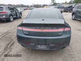2015 Lincoln MKZ Hybrid with VIN 3LN6L2LU5FR600318, listed as a IAAI auction lot 41554230 with 179,935 mi miles. Bid and sale history available at carsss.com. Image 16.