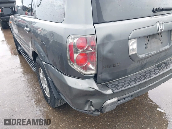 2008 Honda Pilot EX-L with VIN 5FNYF28548B007852, listed as a IAAI auction lot 42387060 with 261,023 mi miles and . Bid and sale history available at DreamBid. Image 14.