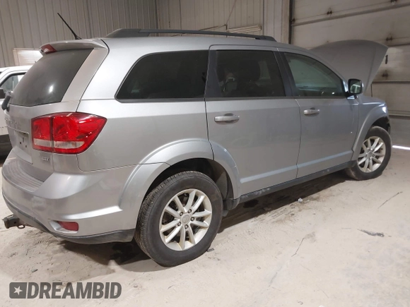 2015 Dodge Journey SXT with VIN 3C4PDDBG4FT544162, listed as a IAAI auction lot 41320028 with 128,475 mi miles and . Bid and sale history available at DreamBid. Image 4.