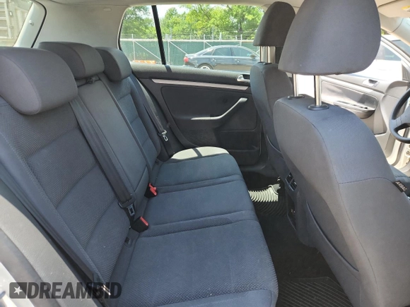2009 Volkswagen Rabbit S with VIN WVWDB71K79W120196, listed as a Copart auction lot 62126625 with 105,695 mi miles and Salvage title. Bid and sale history available at DreamBid. Image 10.